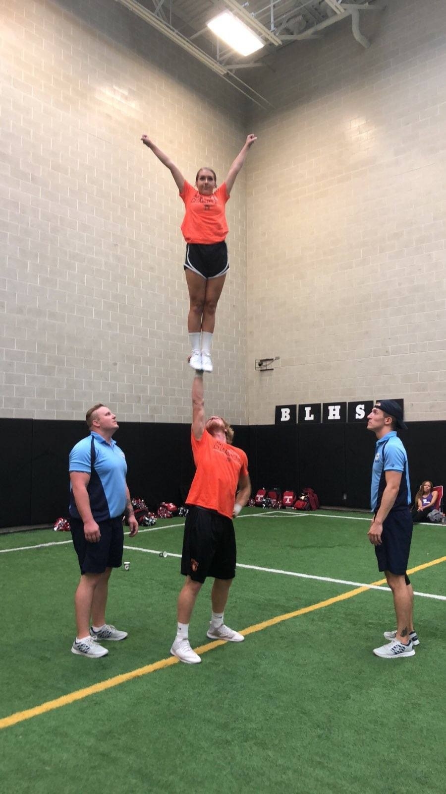 cheerleaders stunting